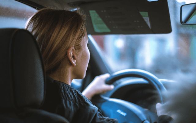 Person driving a car