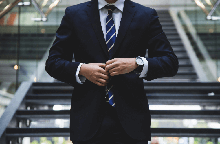 Man in Suit and Tie - Hunters Race