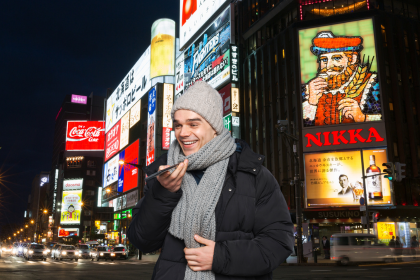 man talking on phone in Sapporo